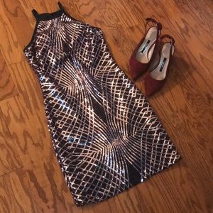 Crystal Doll black and rose gold sequin dress.